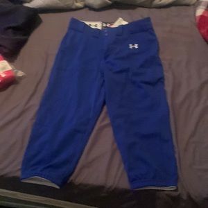 Brand new under armour royal blue softball pants. Size medium. Never worn